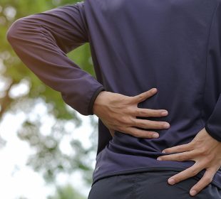A person suffering from backpain